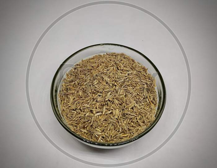 Common Cumin Or Zeera In A Glass Bowl On White Background Stock Photo
