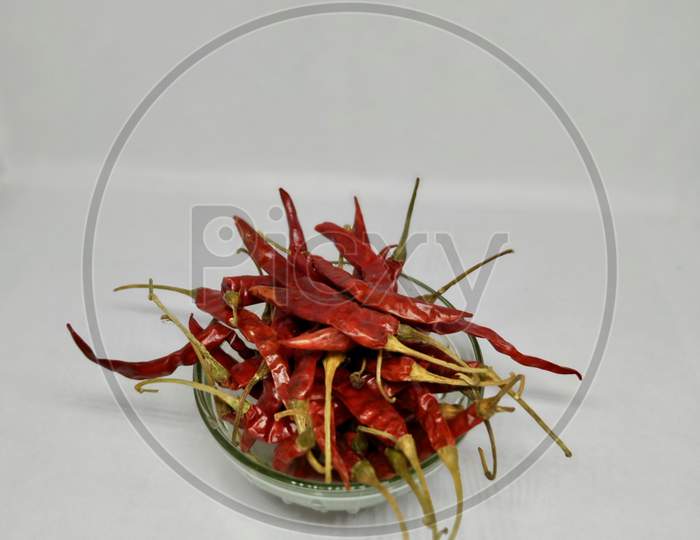Dry Red Chilli Peppers. Isolated On White Background Stock Photo