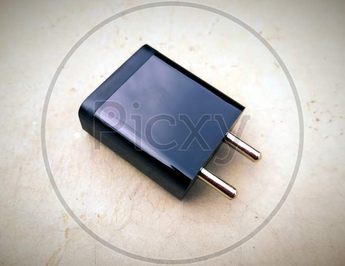 black fast mobile charger put on the road