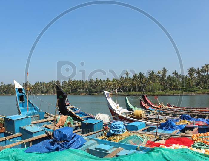 colourful boats at back waters in kerala