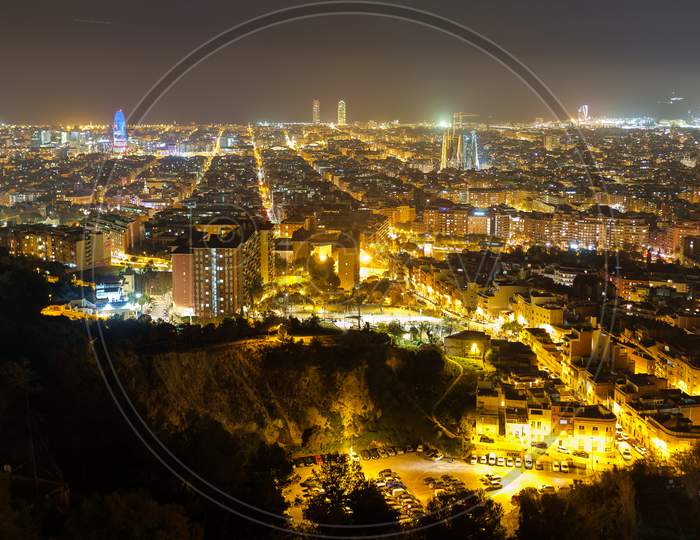 View from the top of Park Guinardo, one of the east side hills in Barcelona, on the night skyline of Barcelona