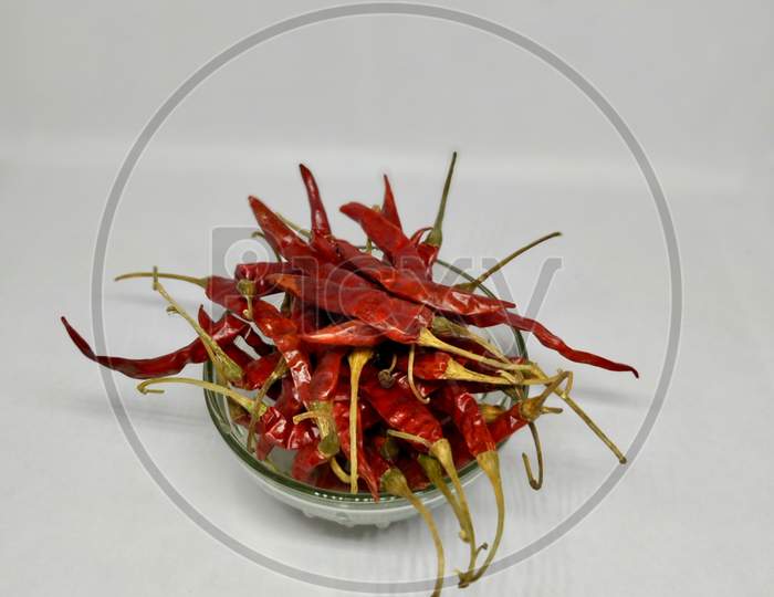Dry Red Chilli Peppers. Isolated On White Background Stock Photo