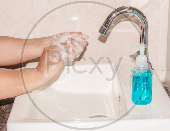Hand Hygiene - Corona virus prevention, Cleaning Hands with Hand washing Soap. Protection by washing hands frequently