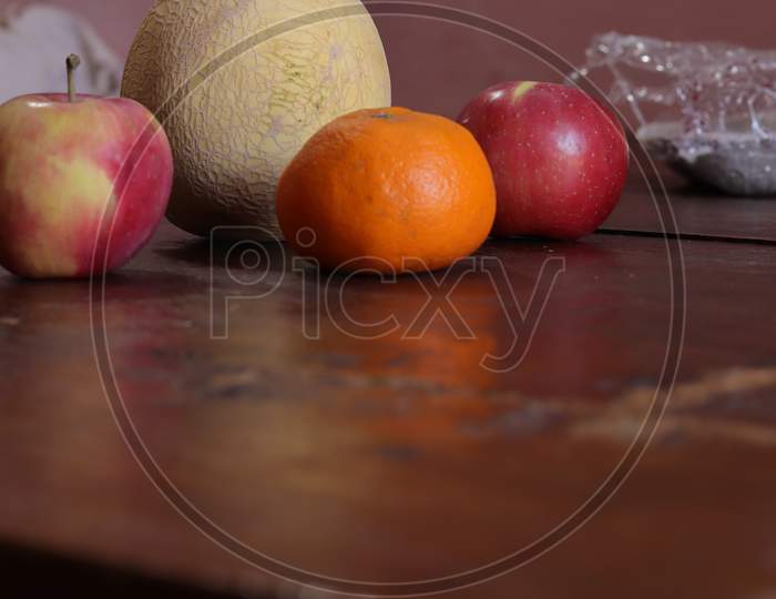 Fresh red apple isolated on wood background
