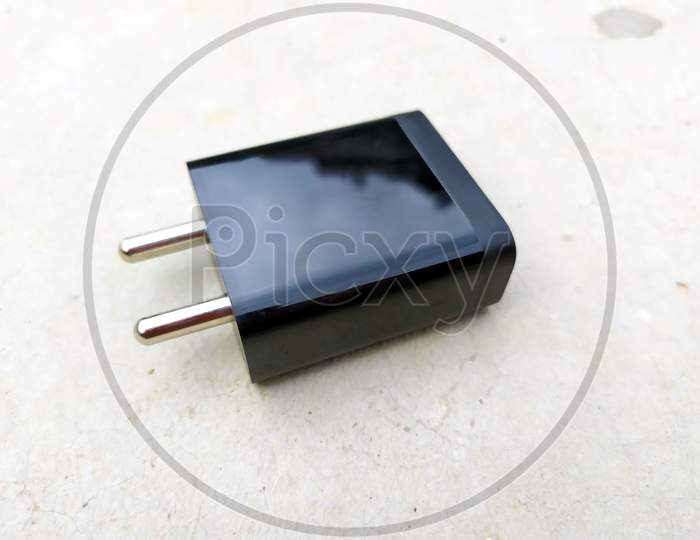 black fast mobile charger put on the road
