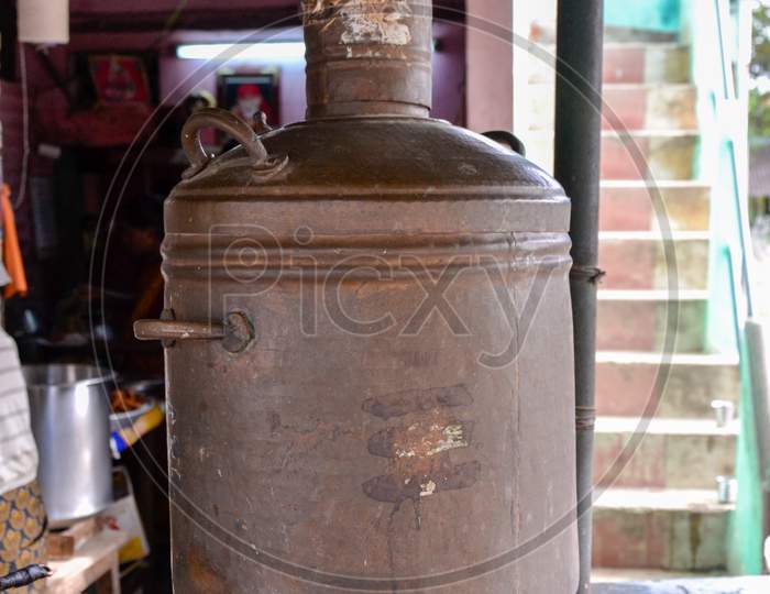 Antique coal fired copper water boiler heater in Tirupati