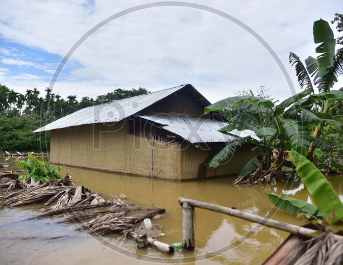 A Submerged Hut At Flood Affected Bakulguri Village Near Kampur In Nagaon District Of Assam On May 27,2020.