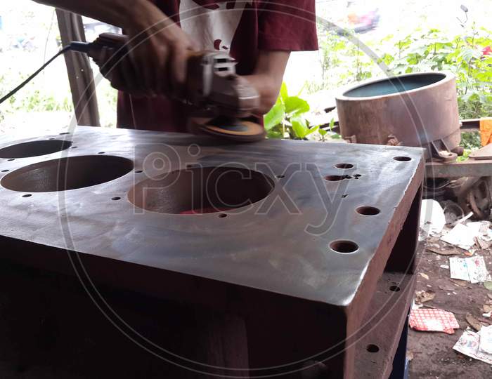 Mechanical work background : cleaning of casting surface