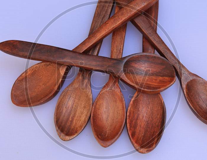 Wooden Spoons Isolated on White Background