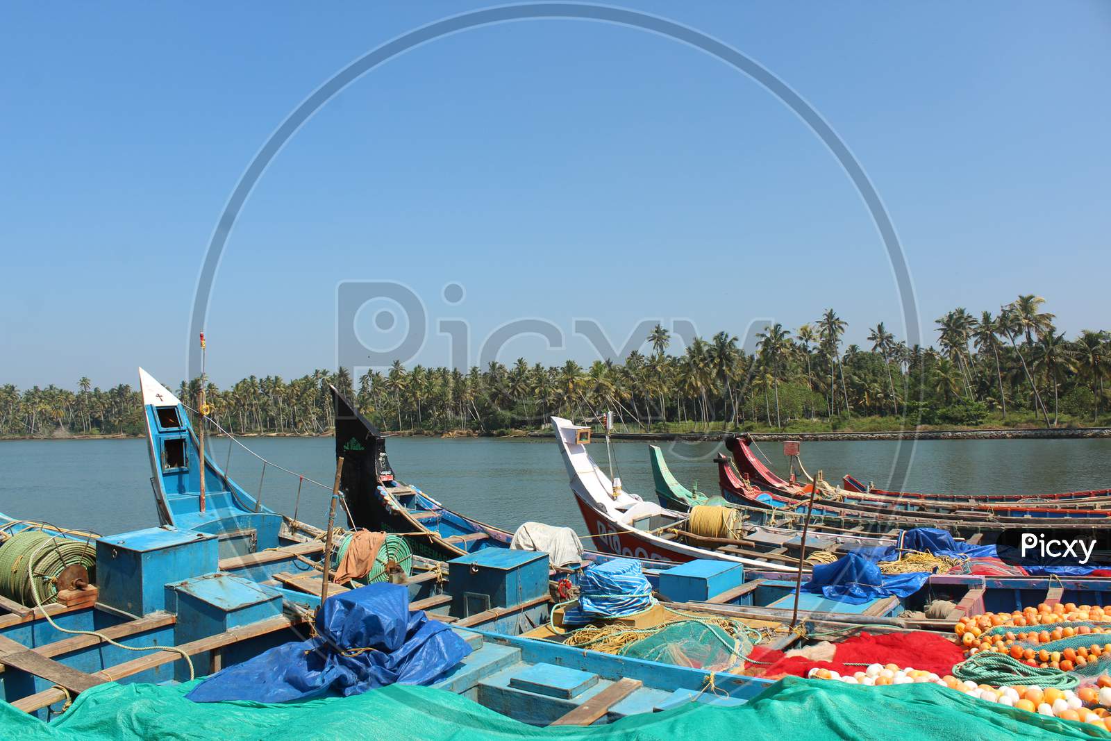 colourful boats at back waters in kerala