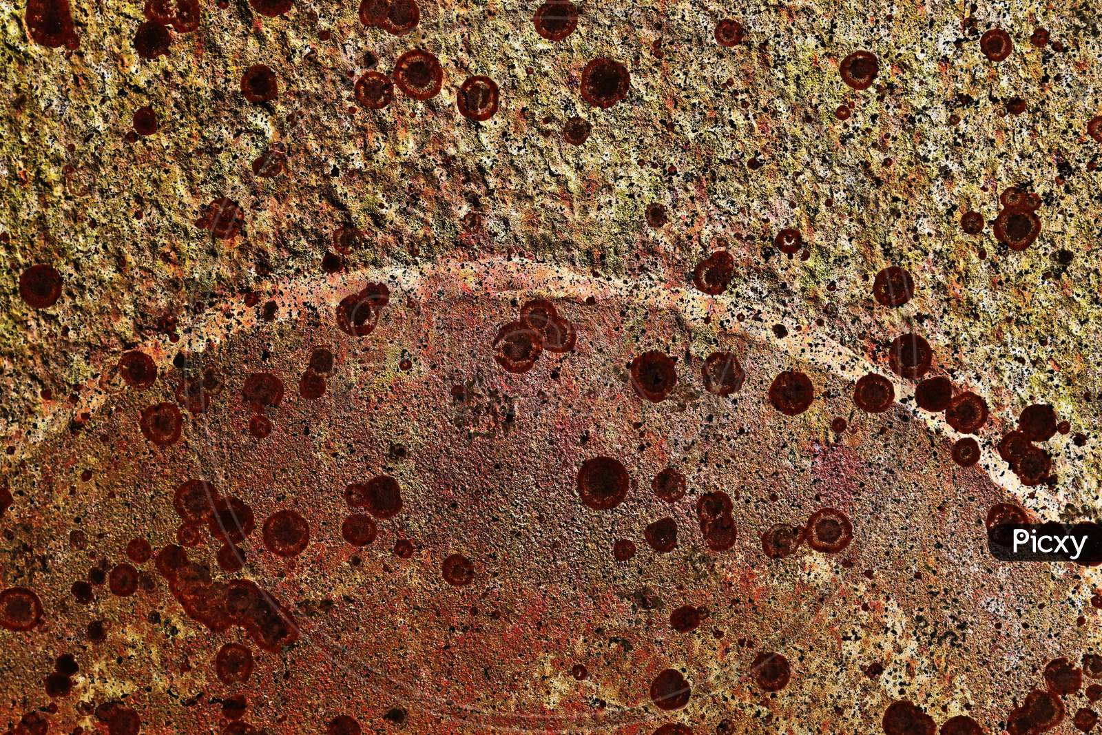 Rusty metal textures on aged and weathered walls in a detailed close up view