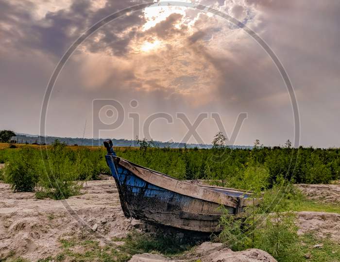 A wooden boat in the dry months.
