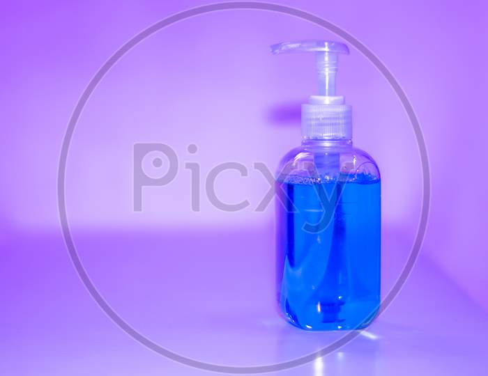 Blue bottles of hand sanitizer and anti-bacterial hand gel, Hand washing, Hand hygiene for Corona virus prevention