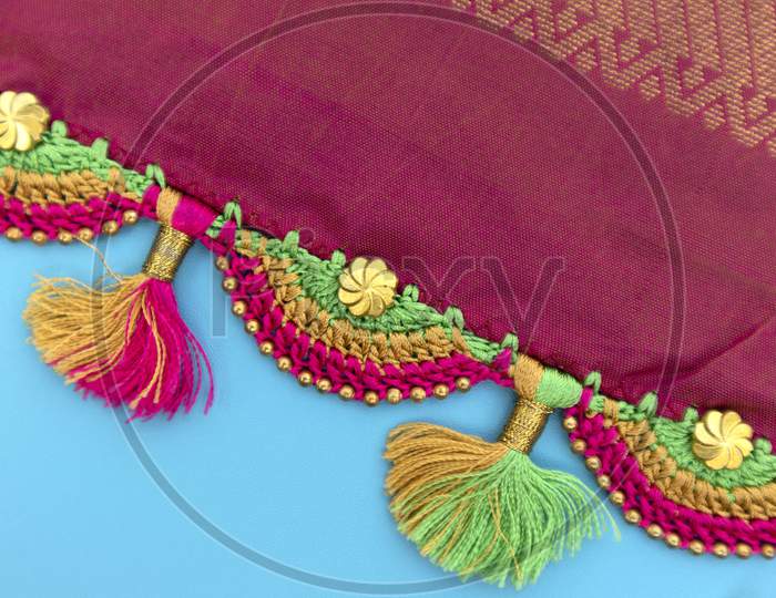 Maski, India - October ,6 2019 - Colorful Crochet, Tassel Fashion Designing Works On Saree Border