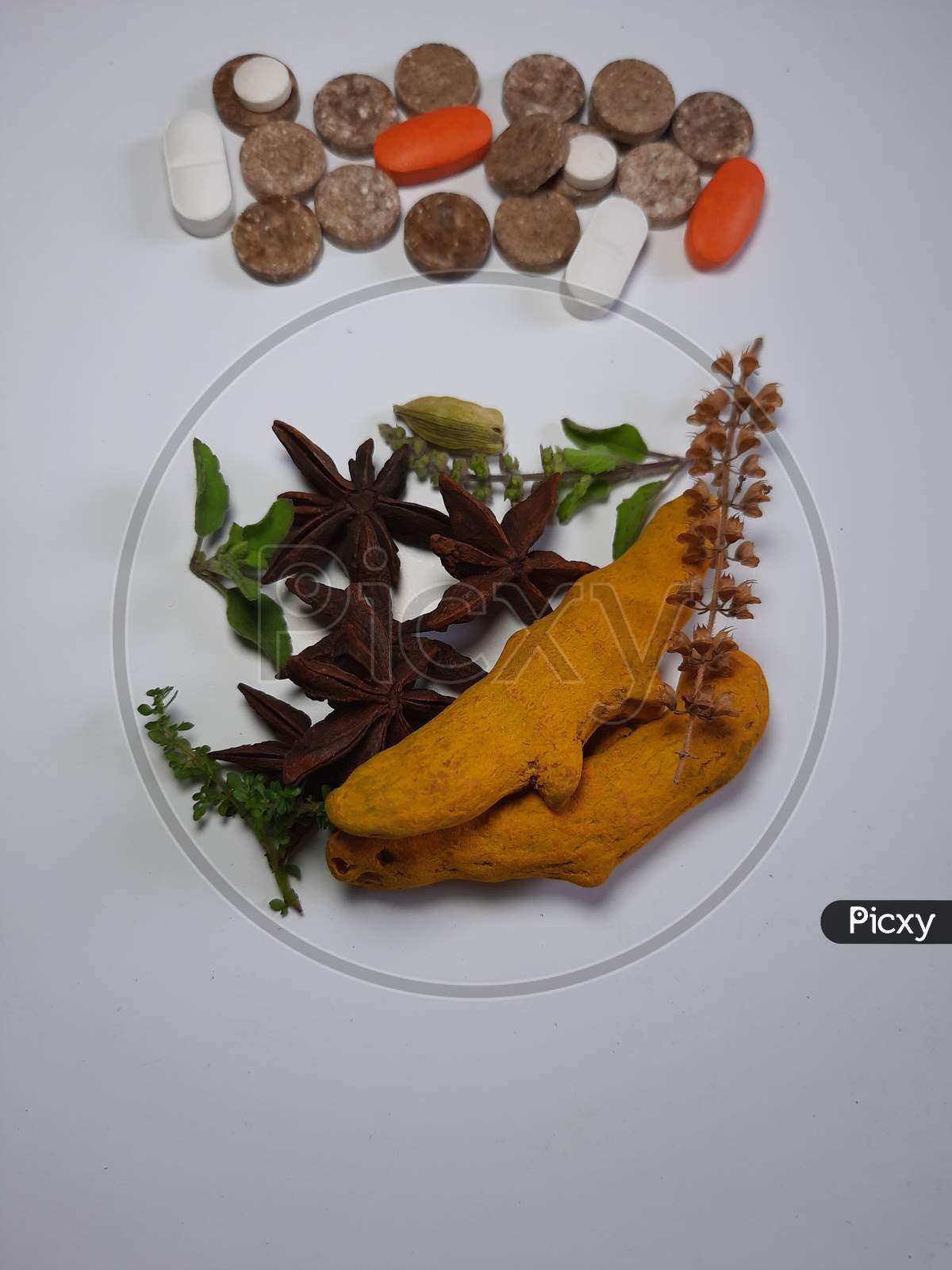 Herbal Medicine Vs Brown Pills Isolated Medicine The Alternative Healthy Car .Leaf ,Medical On White Background Stock .