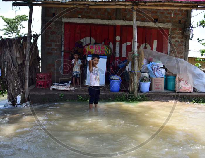 Flood Affected Families Take Shelter In Front Of A Shop    At Doboka  In  Hojai  District Of Assam  On May 28,2020.
