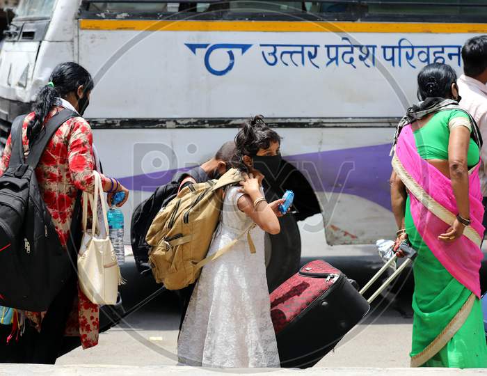 Migrants Waiting To Board Buses To Their Native Places During Extended Nationwide Lockdown Amidst Coronavirus Or COVID-19 Pandemic in Prayagraj