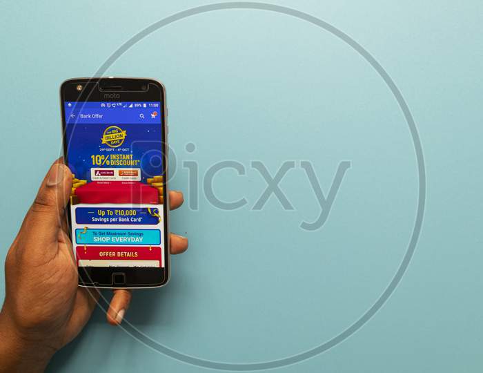 Maski, India - October ,6 2019 - Close Up Of Hands Using Flipkart App Showing Big Billion Days On Mobile