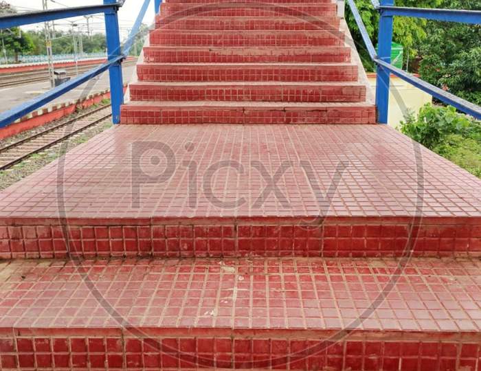 Red coloured tiles made stairs
