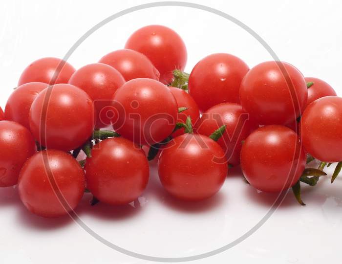 Bunch of fresh organic cherry tomatoes