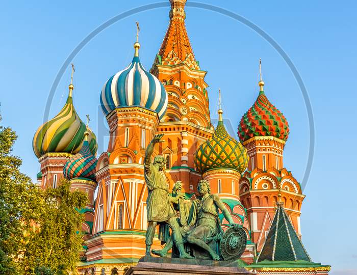 Monument To Minin And Pozharsky And St. Basil Cathedral In Moscow, Russia