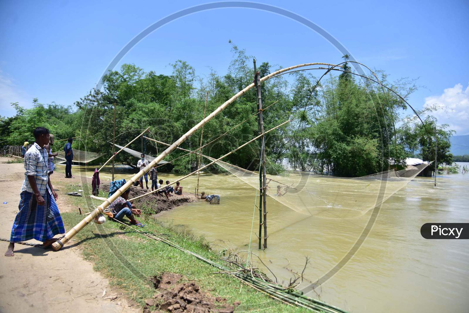 Villagers  Fishing On Flood Water  At Doboka  In  Hojai  District Of Assam  On May 28,2020.