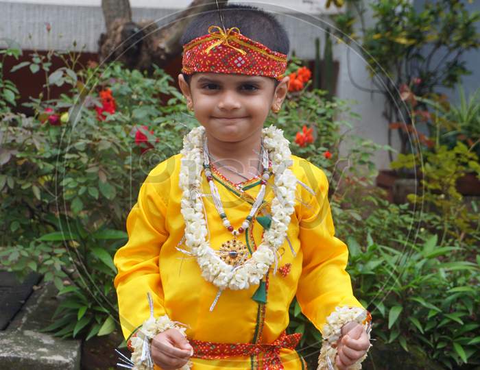Young Boy Dressed As Krishna