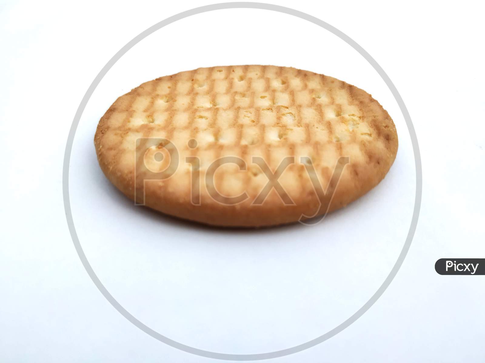Digestive whole wheat round biscuits isolated on white back ground