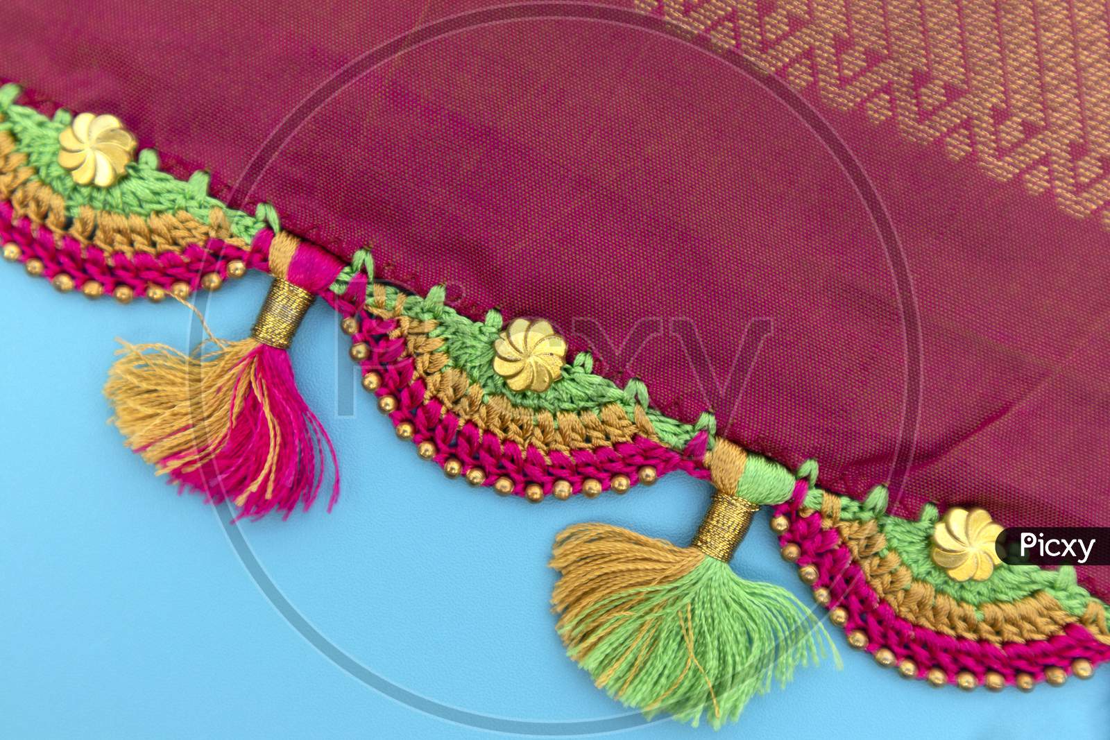 Maski, India - October ,6 2019 - Colorful Crochet, Tassel Fashion Designing Works On Saree Border
