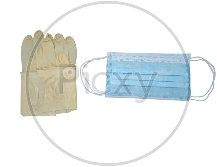 Disposable Protective Surgical Mask And Gloves Isolate In White Background.