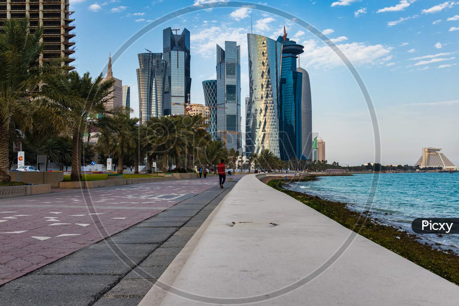 Doha cor niche in West Bay area Daylight view with skylines and clouds in sky in background
