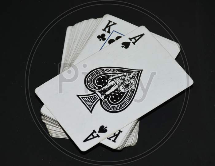 Deck of cards . In black background . Ace of spades . Joker card . Cards wallpaper .