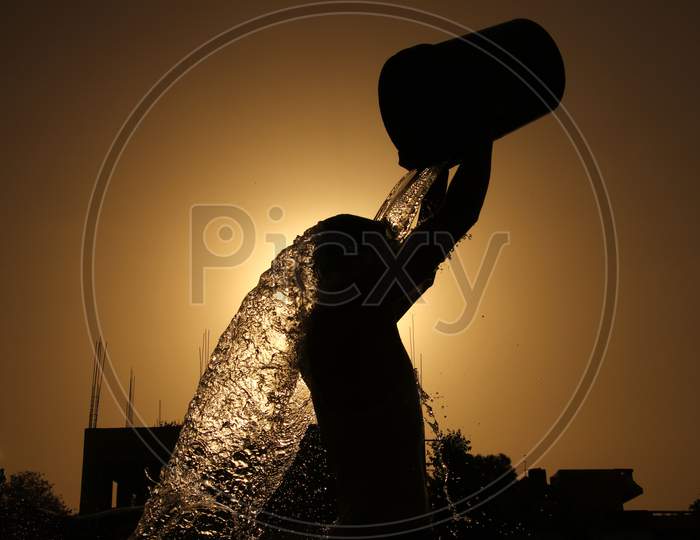 Man Takes Bath On A Hot Day In Ajmer, Rajasthan, India On 28 May 2020.