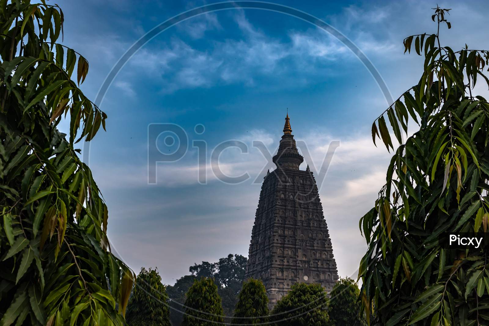 Image of Buddhist Stupas Isolated With Bright Sky And Unique ...