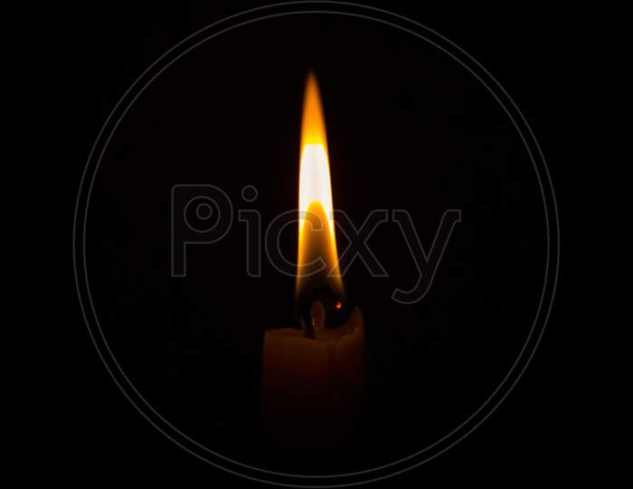 Candle light on black background