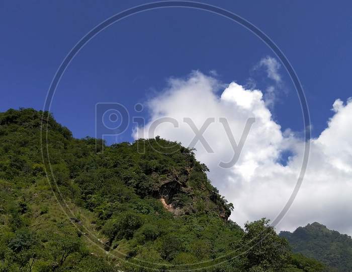 Mountains with blue sky and clouds