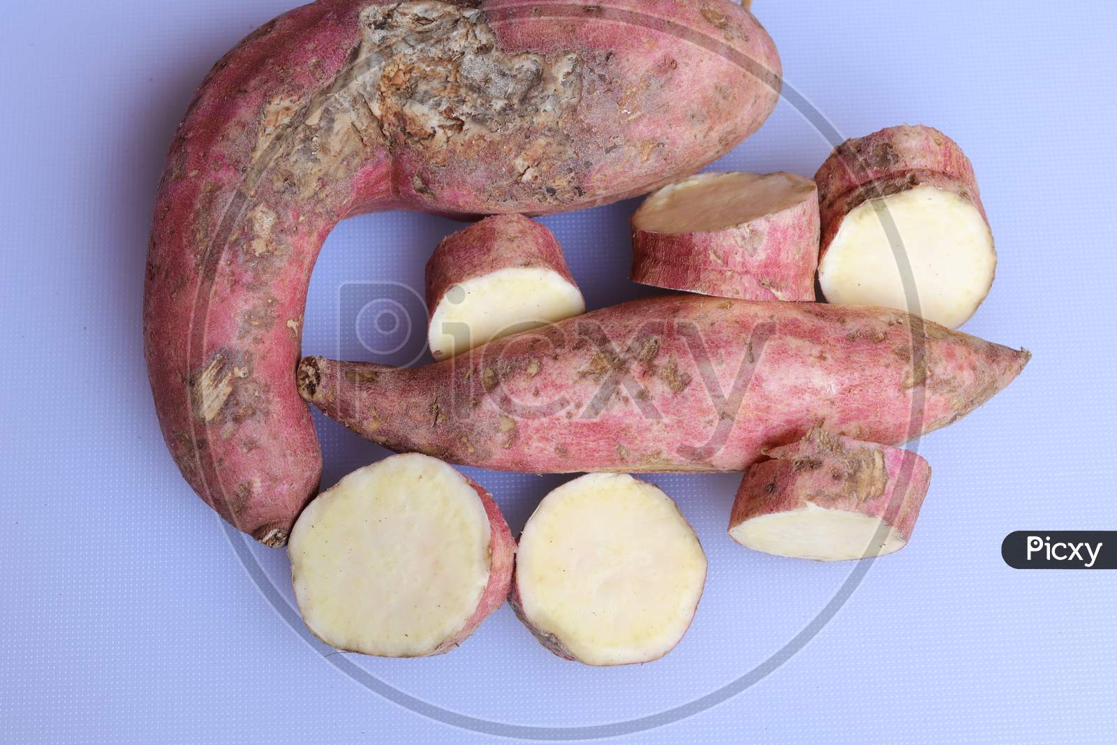 Fresh sweet potato isolated on white background
