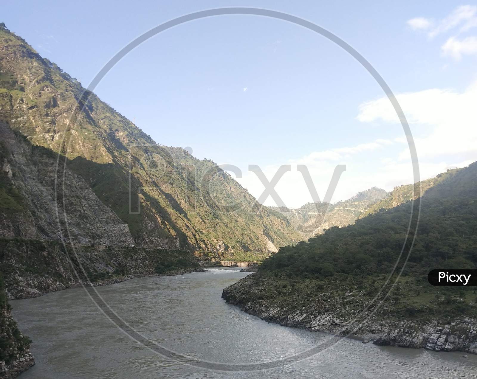 Chinab river landscape with mountains and sky
