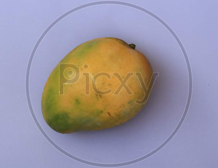 Fresh Yellow Mango fruit isolated on white background