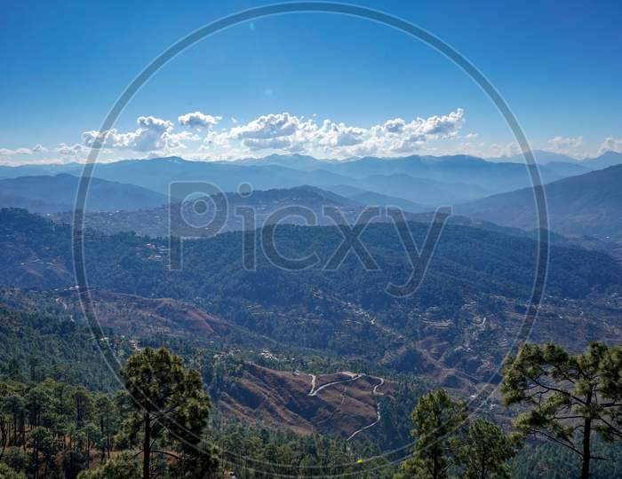 Landscape Of A Mountain Range Clicked From A Height, Layers Of Mountains.