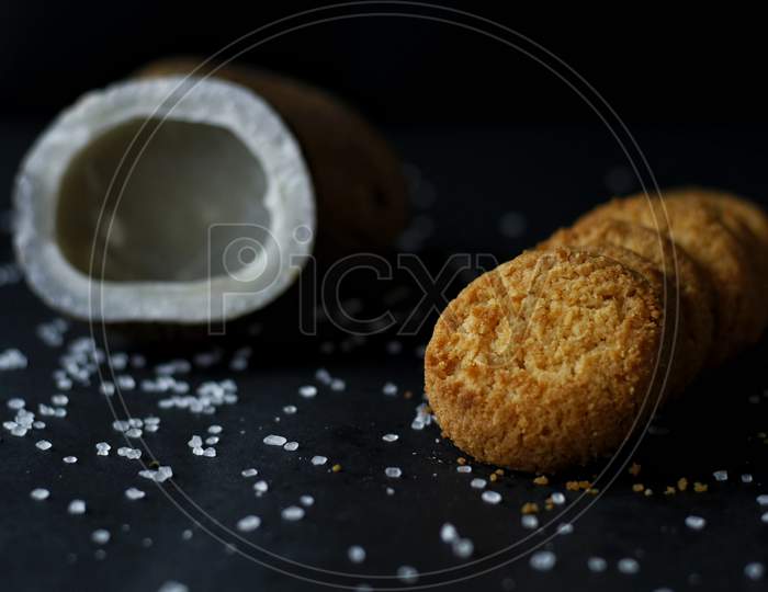 Coconut Cookies With Dark Background And Dried Coconut