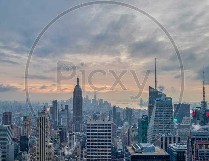 New York skyline from the top of  the Rock (Rockefeller Center)sunset view in Winter with clouds in the sky
