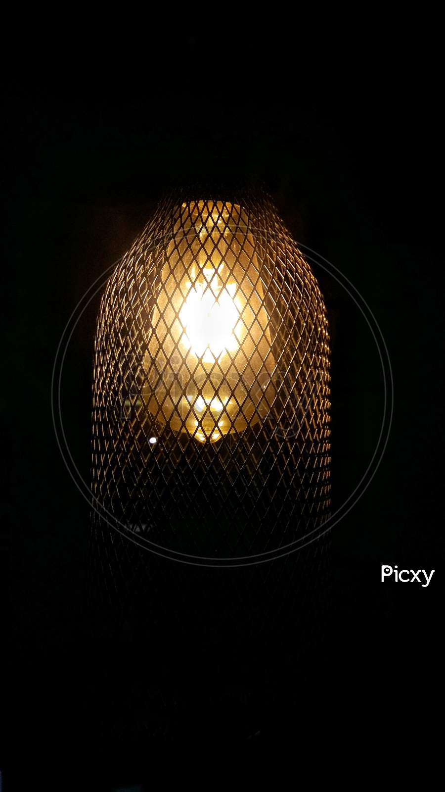 Vintage Light Bulb Lamp Glowing In The Dark.