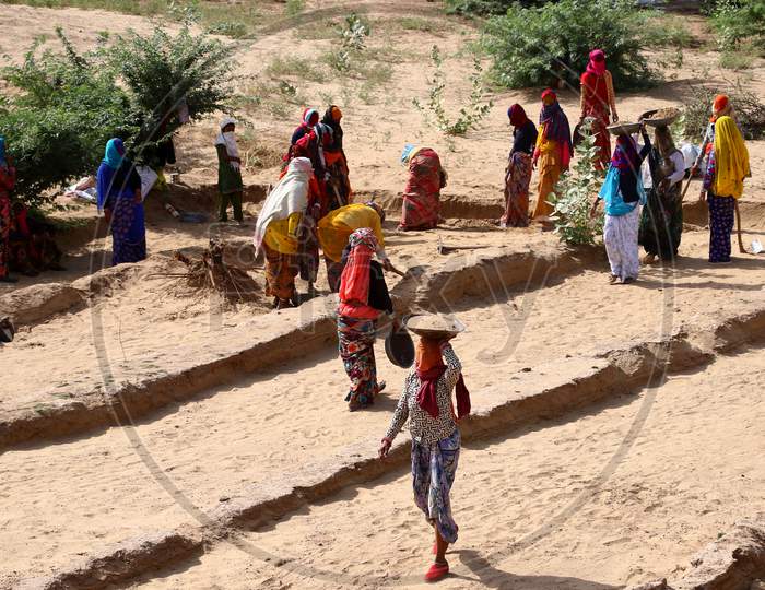 Labourers Under Mahatma Gandhi National Rural Employment Guarantee Act (Mgnrega) Work At A Site On A Hot Day  On The Outskirts Of Ajmer, Rajasthanon 29 May 2020.