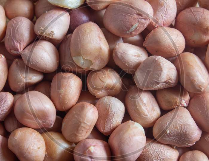 Top View Of Groundnuts Peeled And Raw.