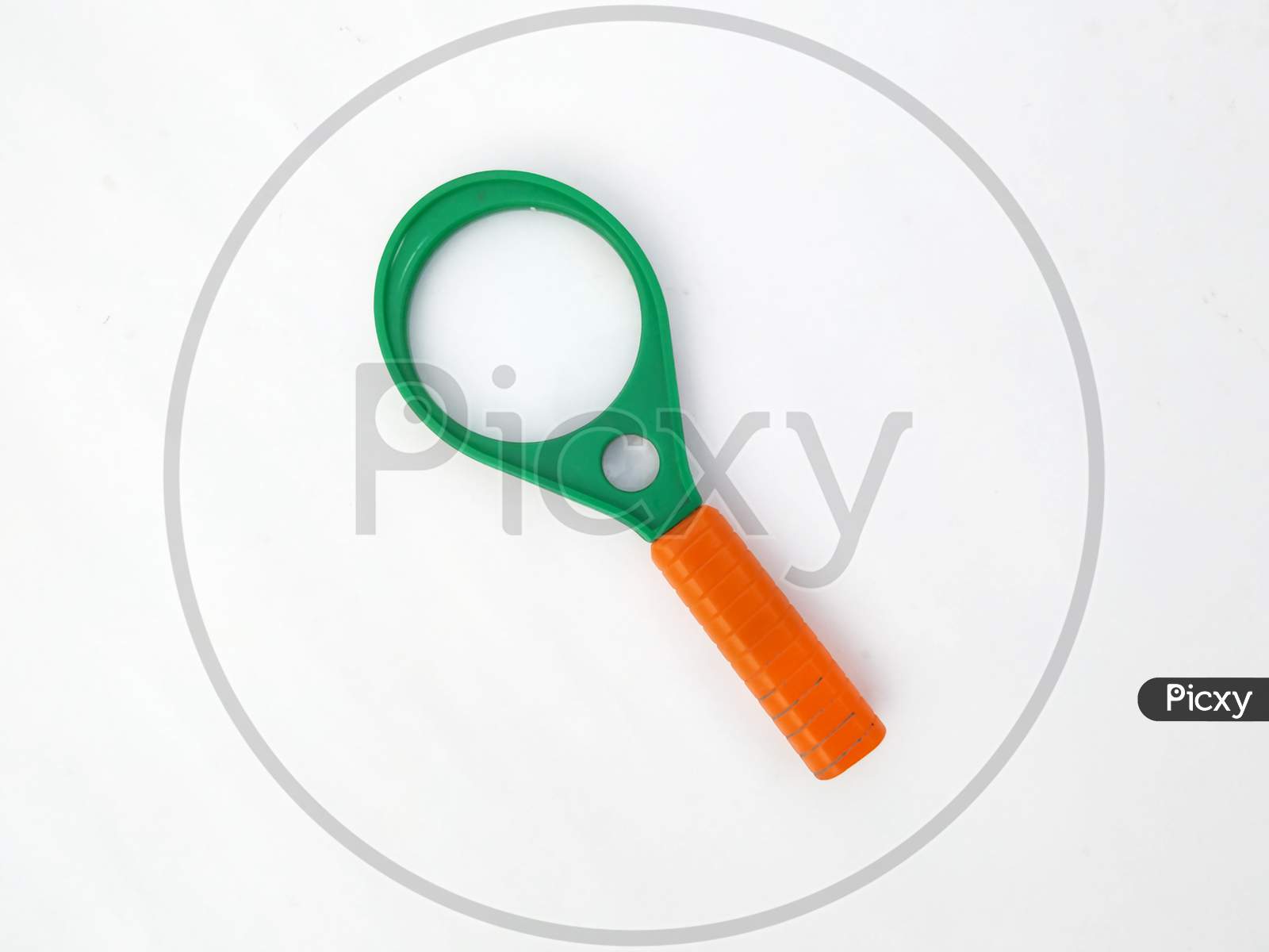 green Magnifying glass isolated on white background
