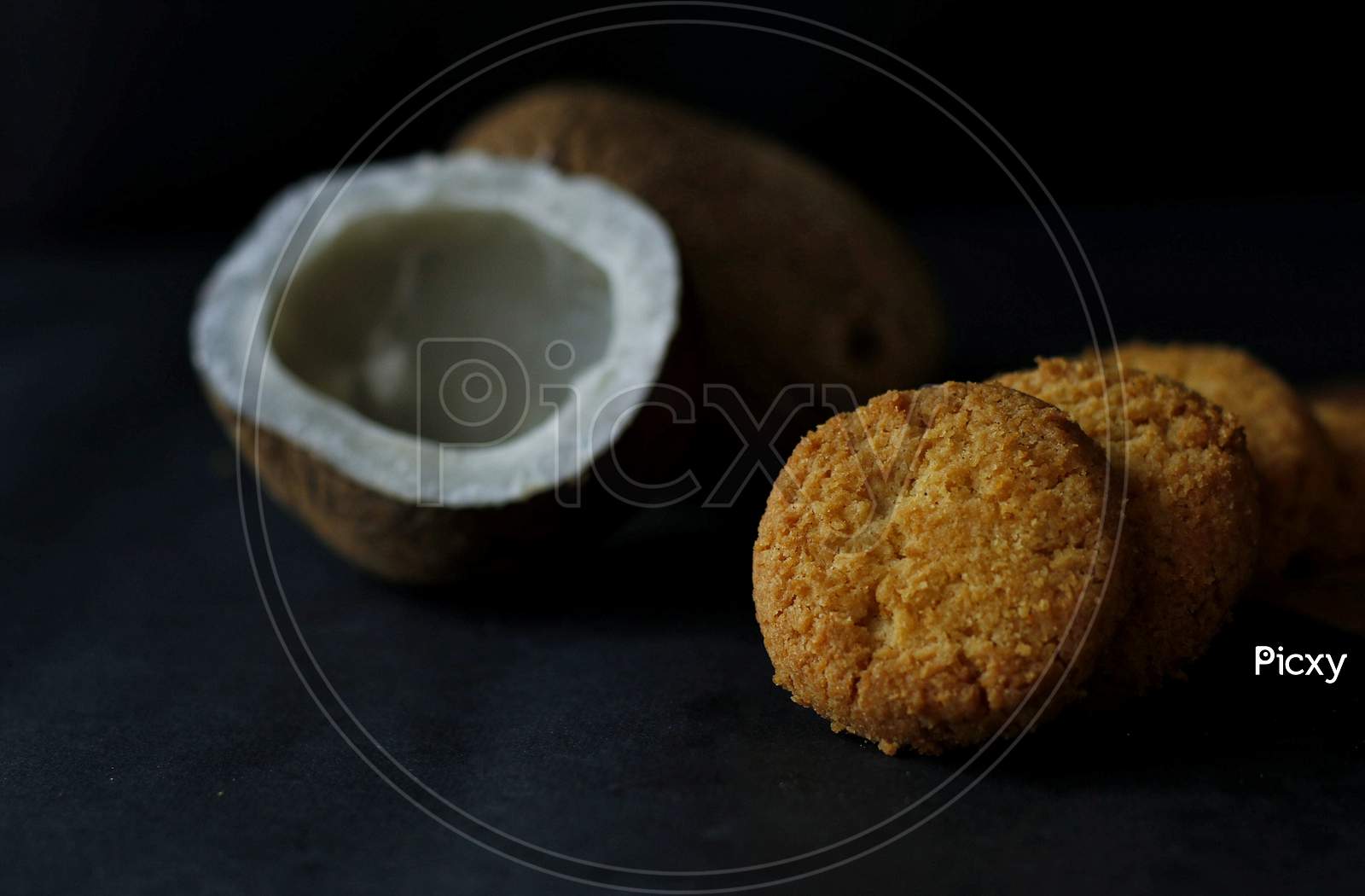 Coconut Cookies With Dark Background And Dried Coconut