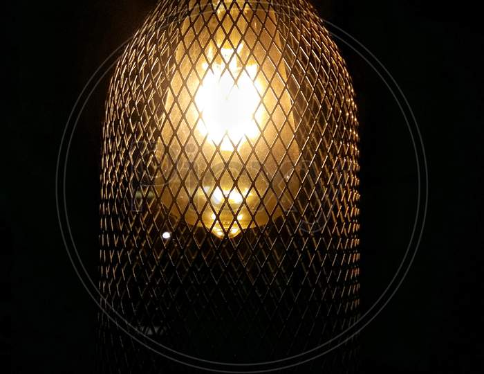 Vintage Light Bulb Lamp Glowing In The Dark.