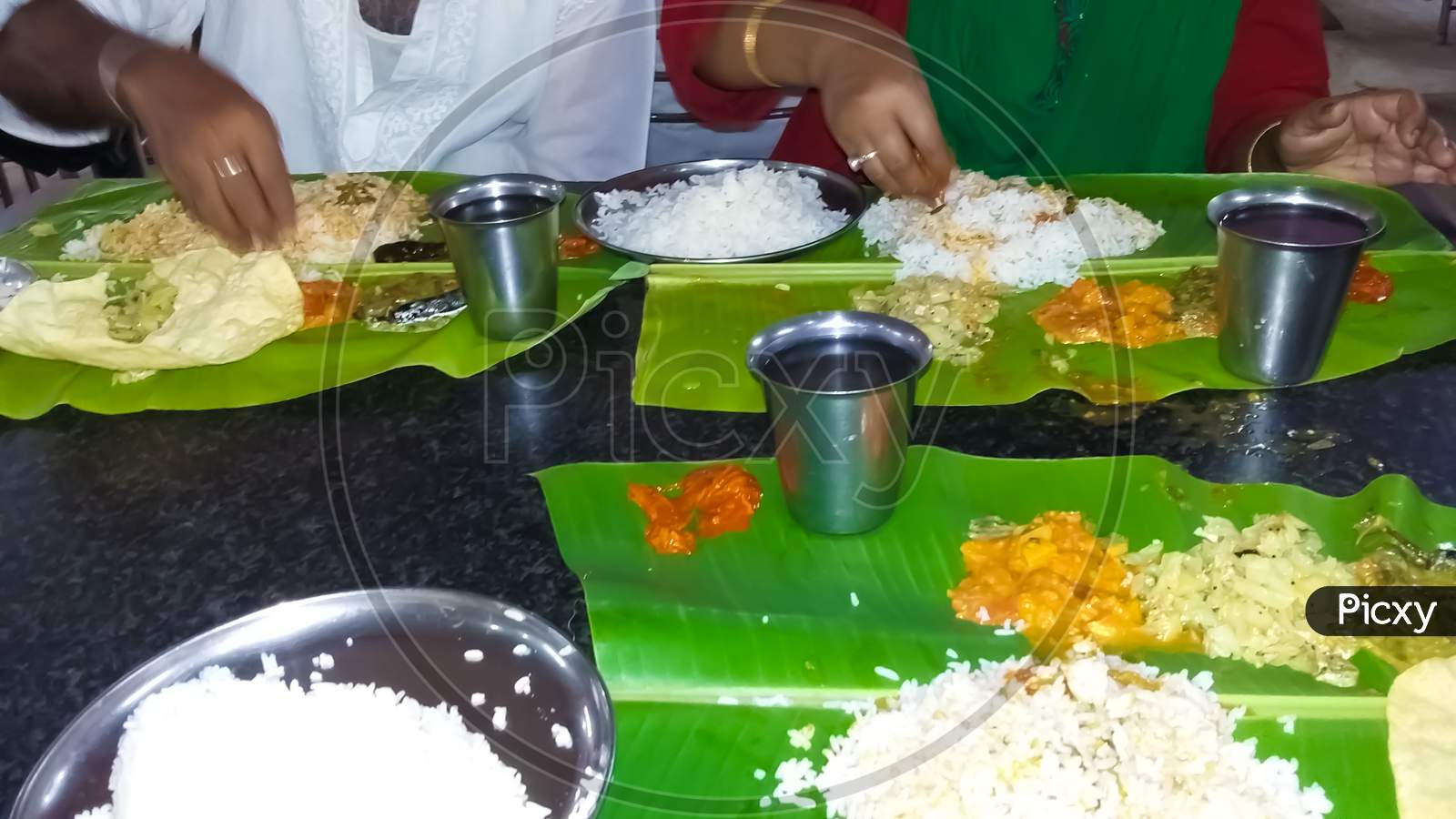 South Indian local food Rice and curry on banana leaves