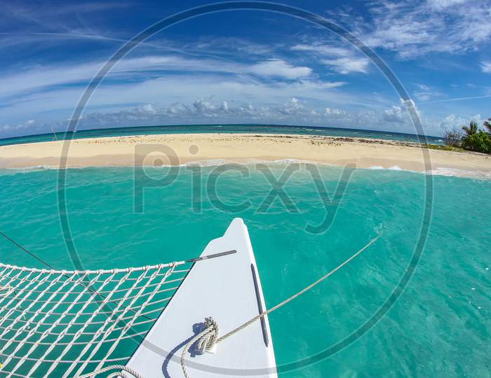 Catamaran Anchored At Beautiful Puerto Rico Beach